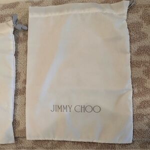 Brand new pair of white Jimmy Chip shoe bags